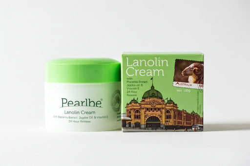 two products: a jar of Pearlbe Lanolin Cream and a box of Lanolin Cream with a picture of a building.