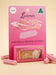 a pink packaging for a lip balm product called "My Lips Are Seated" by Lucamar, which is a natural and organic lip balm.