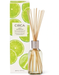 a glass diffuser filled with sticks and a box with a lime and lemon grass design, both containing a fragrance oil.