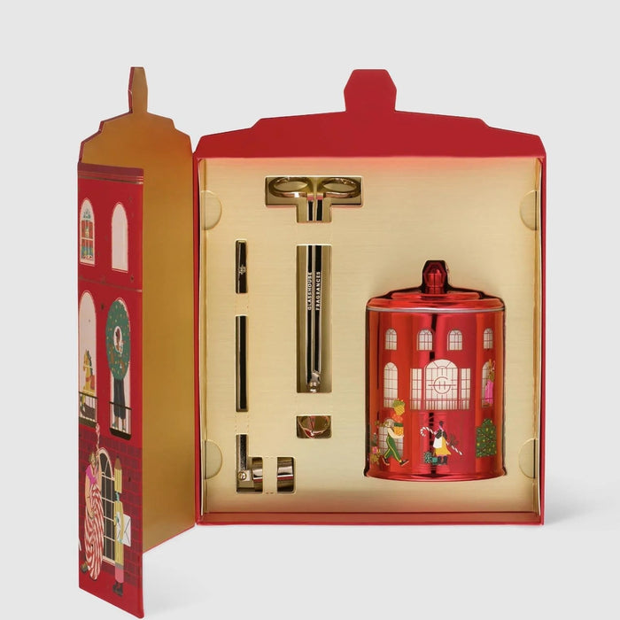 a red box with a lid and a red jar with a lid, both of which are decorated with illustrations of people and buildings.