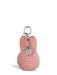 A pink, coiled keychain with a silver metal clasp and a small tag attached to it.