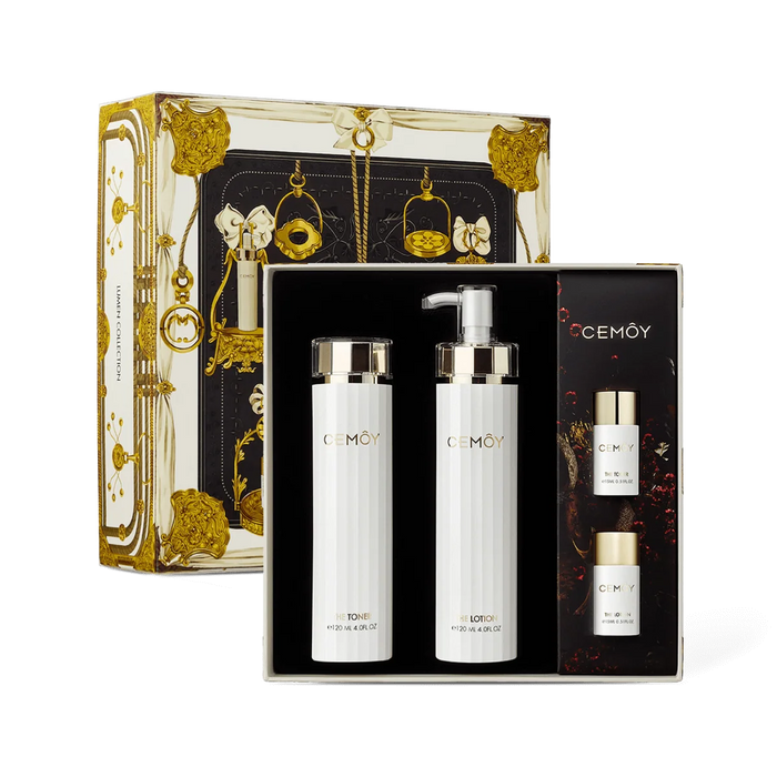 a set of three beauty products from the brand CEMOY, including a pump bottle, a pump bottle, and a spray bottle, all presented in a luxurious, gold-colored box.