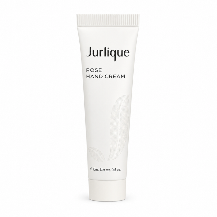 A tube of white hand cream with the brand name "Jurlique" printed on it.