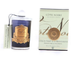 a blue glass candle with a gold label and a white box with a gold label, both of which are labeled as "Côte Noire" and "Citron Vert a la Mandarine".
