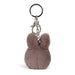 A keychain in the shape of a small, furry animal, possibly a bunny or a squirrel, with a metal clasp attached to it.