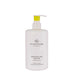 A white pump bottle with a yellow cap, containing a hand lotion product labeled "MONTEGO BAY Rythm" and "COCONUT LIME".