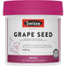 a bottle of Swissse Beauty Grape Seed supplement, which is a bright-colored pill.