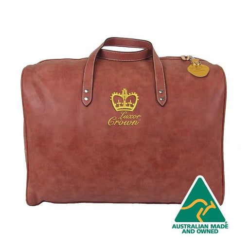 A brown leather duffel bag with a gold crown logo and the text "Luxor Crowni" printed on it.