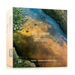 The image is a box for an Australian wool quilt, featuring an aerial view of a river and lush greenery.
