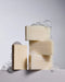 three rectangular bars of soap with the word "GLASSHOUSE" printed on them, with bubbles surrounding the bars.