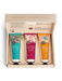 A hand cream set in a box, containing three different hand creams with distinct scents and colors.