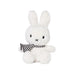 A white stuffed rabbit wearing a striped scarf.