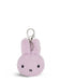 A small, plush keychain in a light purple color.
