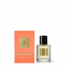 a bottle of Glasshouse Fragrance in Capri cologne and its packaging, which is an orange box with gold lettering.