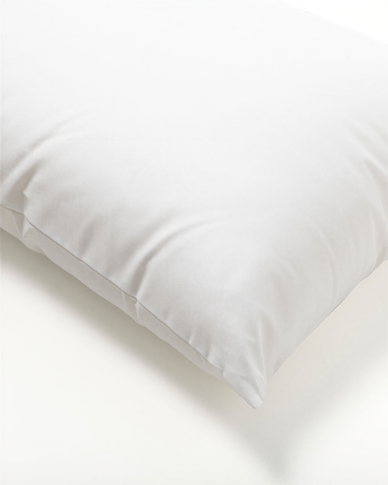 A white pillow with a smooth, unblemished surface.