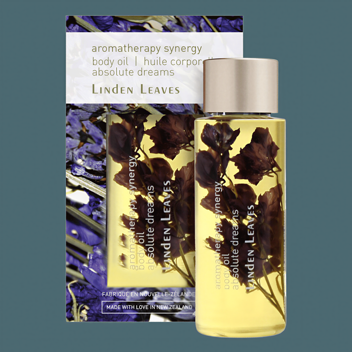 a bottle of Linden Leaves essential oil, with a clear glass bottle containing the oil and a box with the product's branding and information.