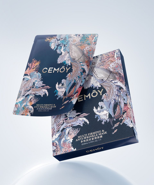 two blue boxes with a floral design, one on top of the other, against a white background.