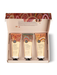A set of three tubes of skincare products, each with a different scent, displayed in an open box.