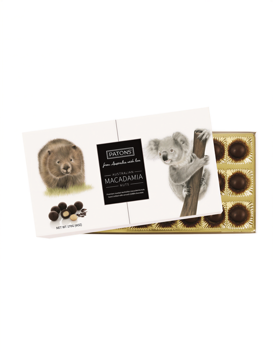 The image is a chocolate box featuring an illustration of a koala bear and macadamia nuts.