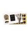 The image is a chocolate box featuring an illustration of a koala bear and macadamia nuts.
