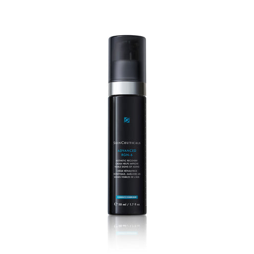 A bottle of skincare product with a black and blue color scheme.