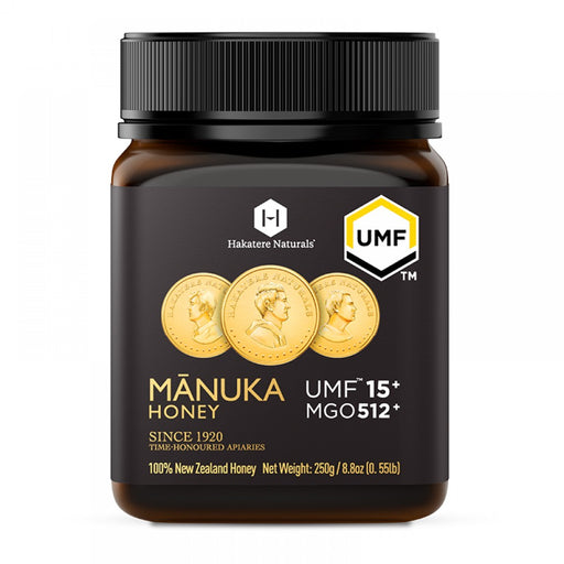 a bottle of Manuka Honey with a black cap and a label that includes text and images.