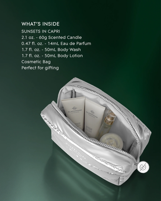 a collection of beauty products, including a Capri candle, a 14mL Eau de Parfum, a 50mL Body Wash, a 50mL Body Lotion, and a 50mL Cosmetic Bag.