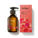 a bottle of Jurlique exclusive edition rose body oil and its packaging.