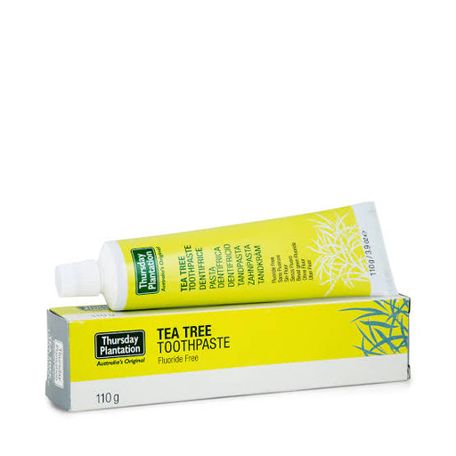 A tube of toothpaste and its packaging are shown against a white background.