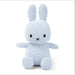 A light blue stuffed bunny toy with large ears and a black x on its face.