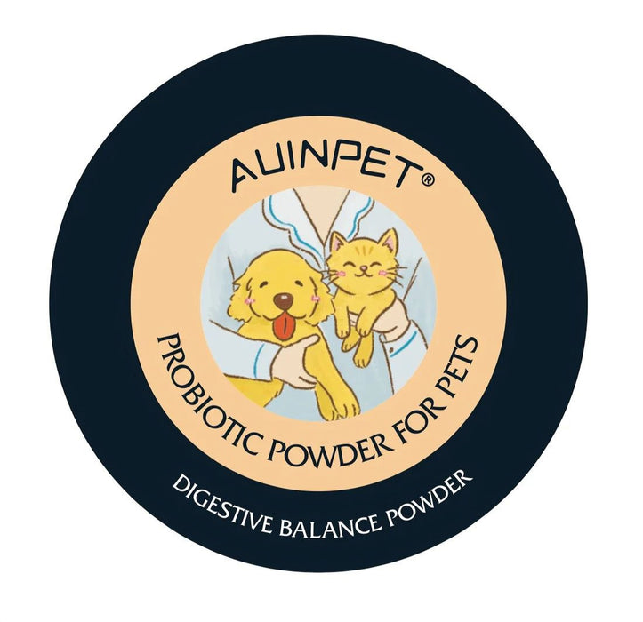 a circular logo with a black background and a light orange border. The logo contains a cartoon image of a dog and a cat, along with the text "AINPET® PROBiotic Powder for Pets" and "DIGESTIVE BALANCE POWDER".