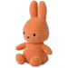 An orange plush toy rabbit with large ears and a small black eye.