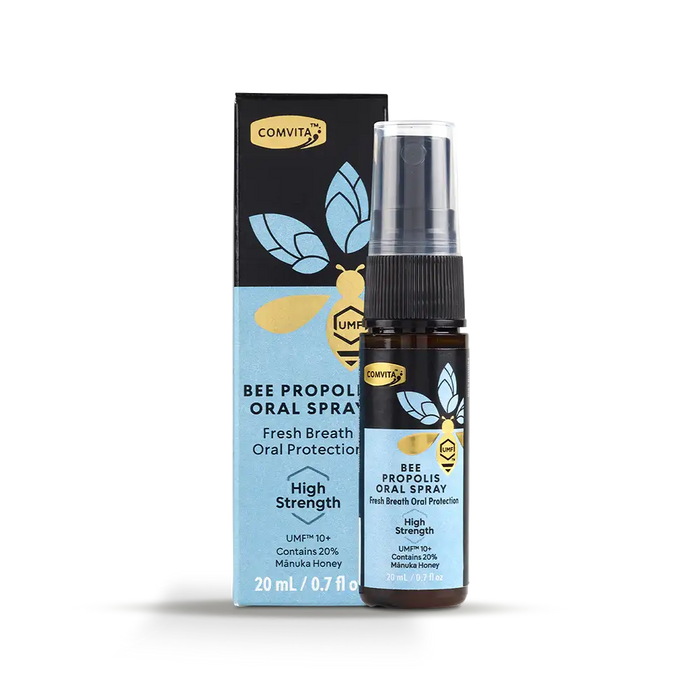 a bottle of Comvita Bee Propolis Oral Spray and its packaging, which is a black and blue box with a clear plastic top.