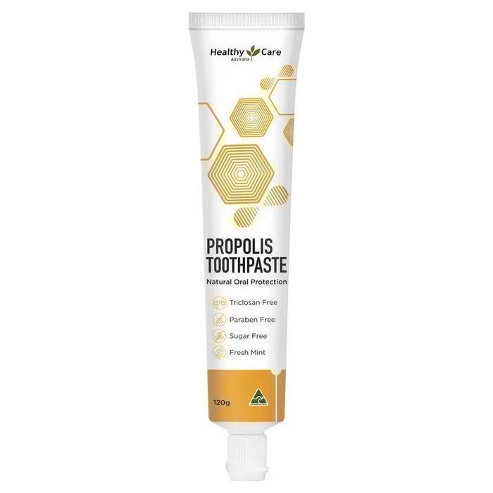 A tube of Propolis Toothpaste, a natural oral protection product, with a label that includes its benefits and features.