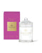 a pink box and a clear glass jar with a lid, both labeled with the brand "GLASSHOUSE Fragrances".