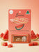 a product packaging for Lucamar lip balm, with a watermelon slice and a small tube of the lip balm in front of it.