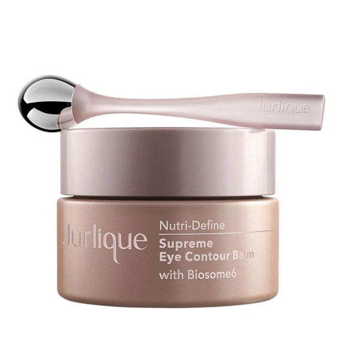 A jar of Jurlique eye contour balm with a spoon on top.