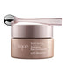 A jar of Jurlique eye contour balm with a spoon on top.