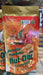 A bag of Australian Macadamia Nut Bar crunchy snacks is displayed on a shelf.