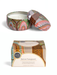 a decorative tin candle holder and its packaging, both with a colorful, patterned design.
