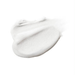 A white, foamy substance is shown against a white background.