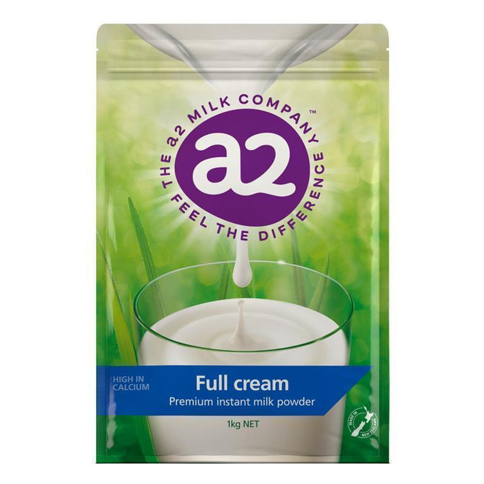 The image is a product packaging for a milk powder called "Full cream". It features a glass of milk with a splash of the powder, and the product is described as a "Premium instant milk powder". The packaging also indicates that it is a "1 kg net" product.