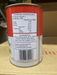 a can of food with nutritional information and ingredients list printed on it.
