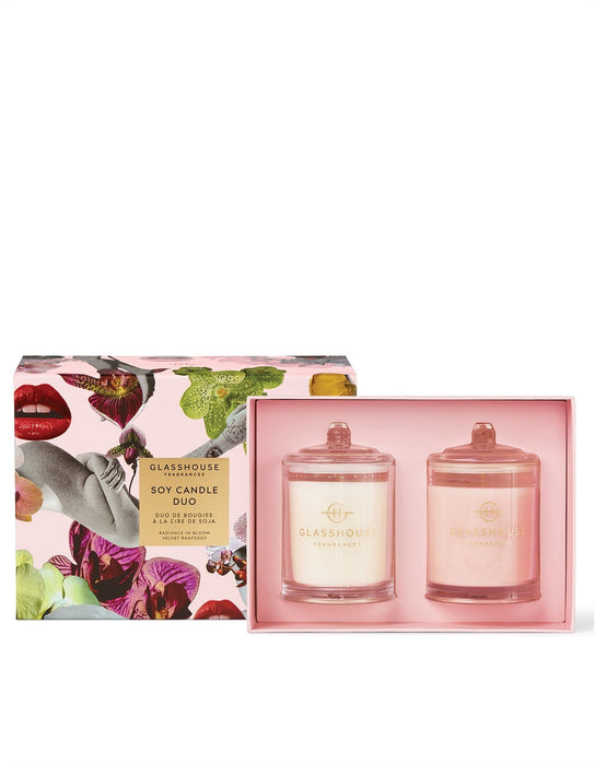 two soy candle sets in a pink box with a floral design.