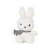 A white stuffed rabbit wearing a striped scarf.