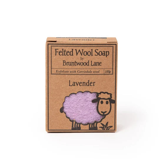 A cardboard box containing a bar of felt wool soap with a sheep illustration on the front.