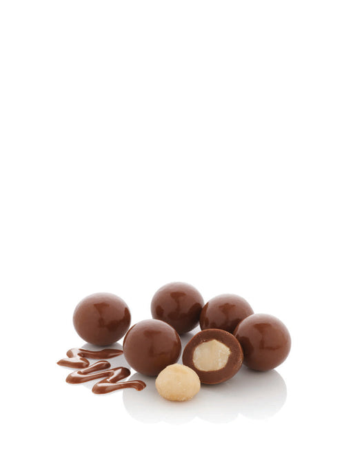 a collection of chocolate-covered nuts and a single nut with a bite taken out of it, all arranged on a white background.