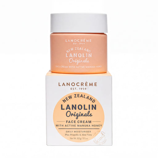 a container of Lanocreme New Zealand Lanolin Origins face cream with active Manuka honey, along with its packaging.