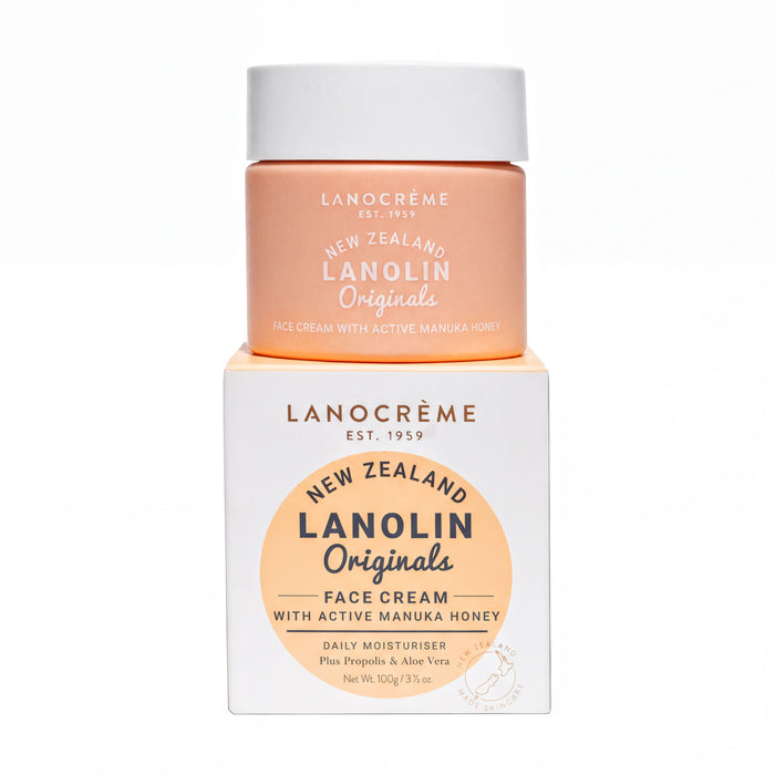 a container of Lanocreme New Zealand Lanolin Origins face cream with active Manuka honey, along with its packaging.
