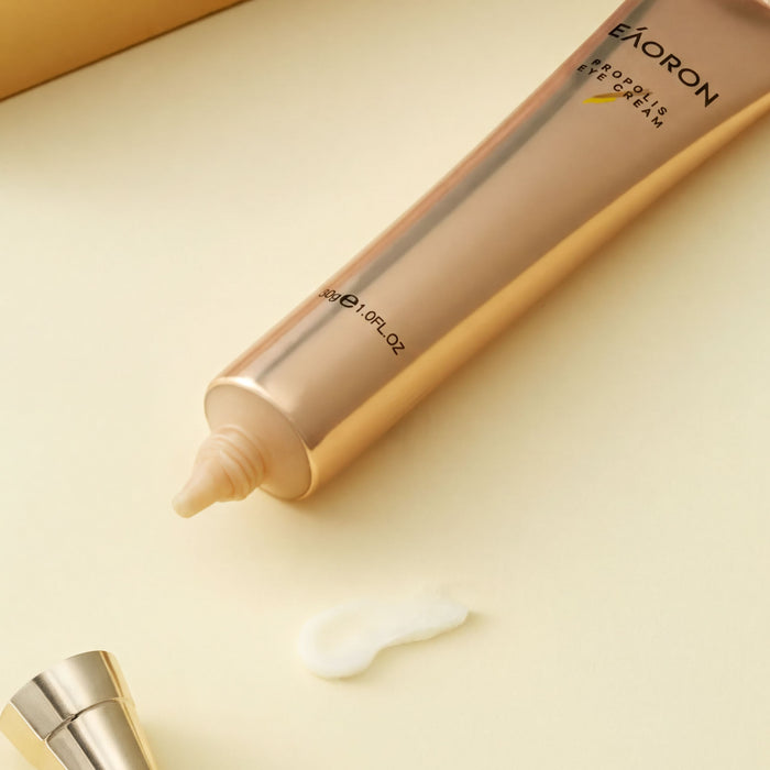 A tube of cream with the brand name "EAORON" printed on it, placed on a light-colored surface.